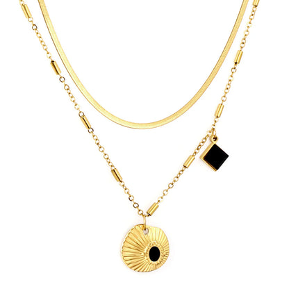 Layered Gold Snake Chain Necklace with Black Onyx Sunburst Pendant