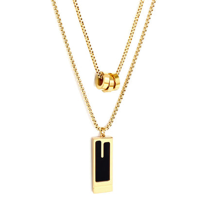 Layered Gold Tone Necklace with Black Bar  & Hollow Pendants